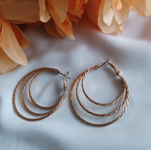 Golden Spiral Hoop Earrings - Picture 15 of 15
